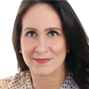 Ein Foto von Dr. Carolin Deiner, auf dem sie freundlich in die Kamera lächelt.