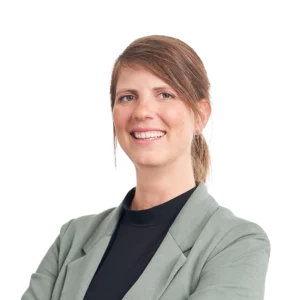 Ein Foto von Sina Gruhn, auf dem sie freundlich in die Kamera lächelt.